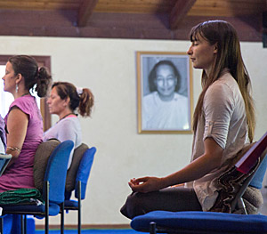 Meditator with Yogananda's photo