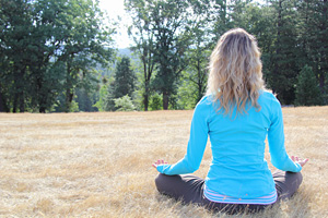 meditator in the meadow expanding light retreat