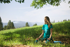 meditator in the meadow expanding light retreat